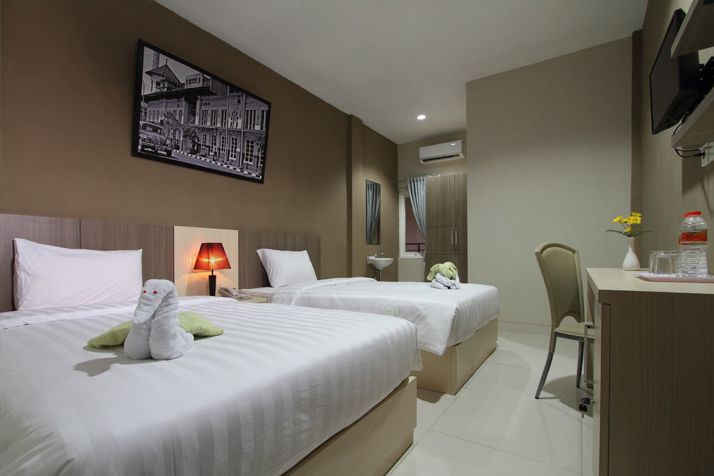 Oyo Flagship 3726 Tembok Batu Residence Tugu Eksteriør billede