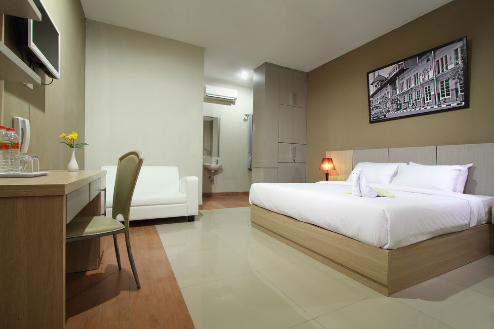 Oyo Flagship 3726 Tembok Batu Residence Tugu Eksteriør billede